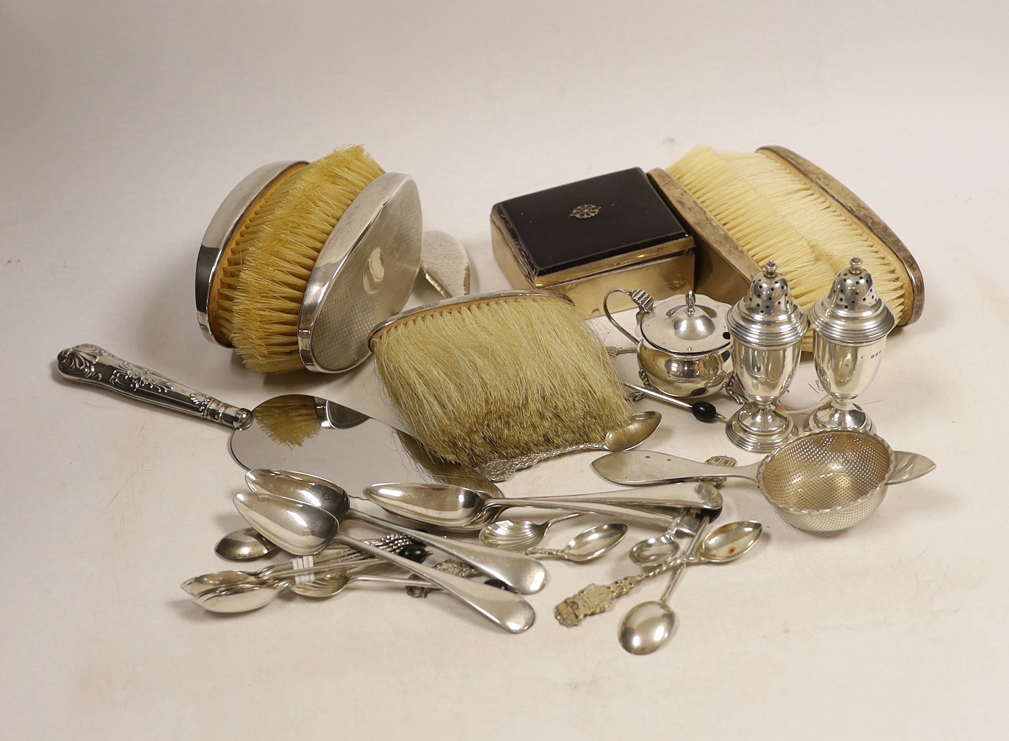 Sundry small silver including flatware, mounted clothes brushes, condiments and mounted cigarette box.